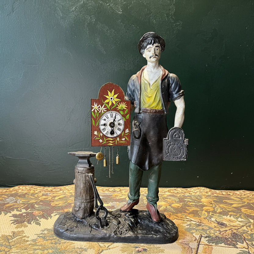 klokkenmaker in werkplaatst